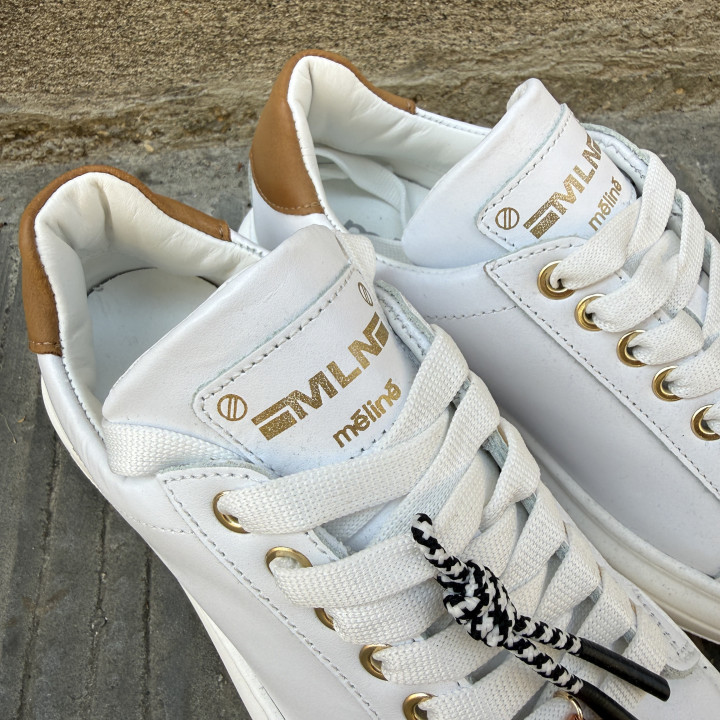 Sneakers bianca e cuoio Meline